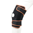 Black knee brace with brown accents on a white background - okotoks hc pharmacy