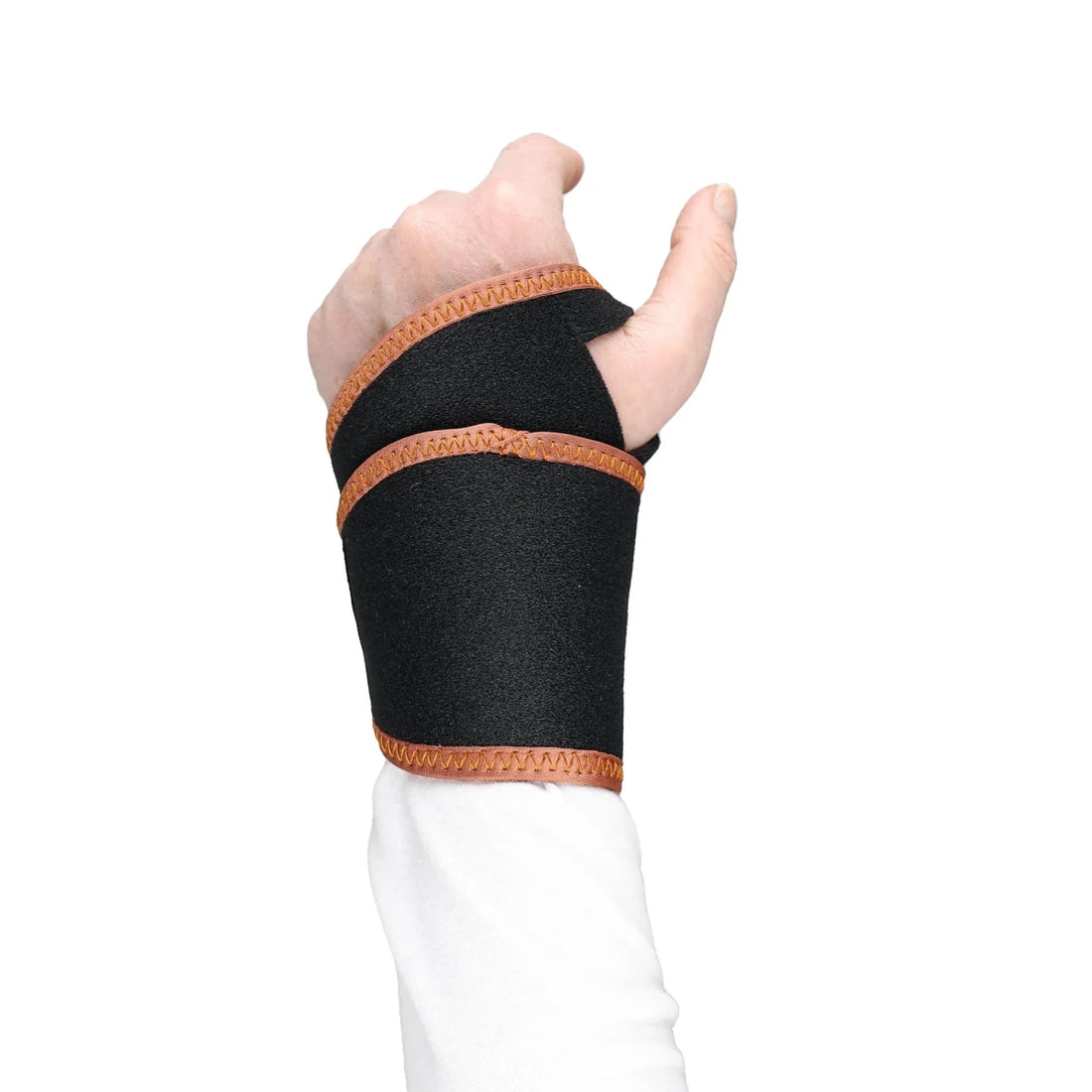 Hand with black wrist support bandage on a white background - okotoks hc pharmacy