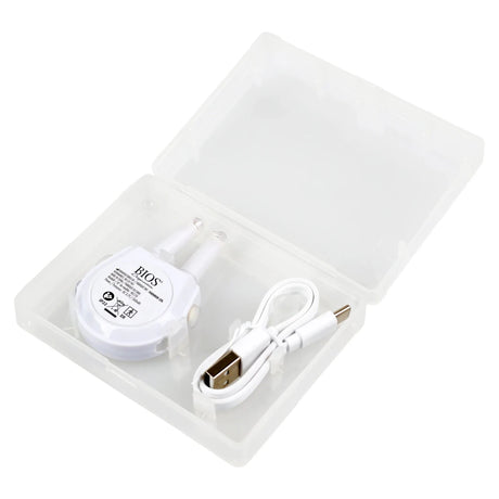 White electronic device with USB cable in a clear plastic case on a white background - okotoks hc pharmacy