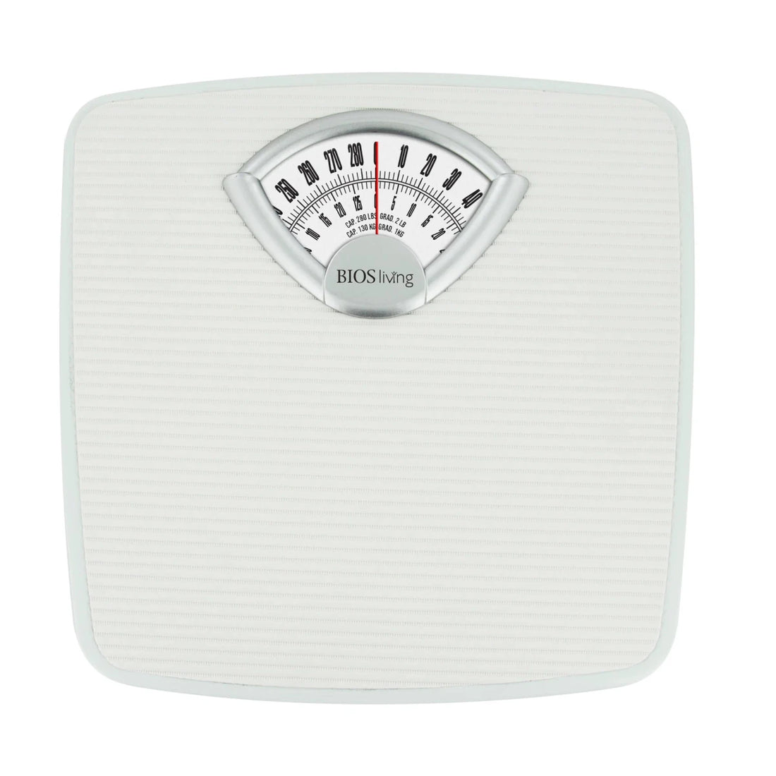 White mechanical bathroom scale with a dial on a white background - okotoks hc pharmacy