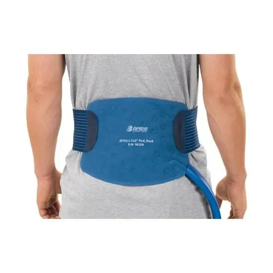 Blue back brace worn by a person on a white background - okotoks hc pharmacy