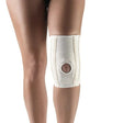 Knee brace on a person's leg with a white background - Okotoks HC Pharmacy