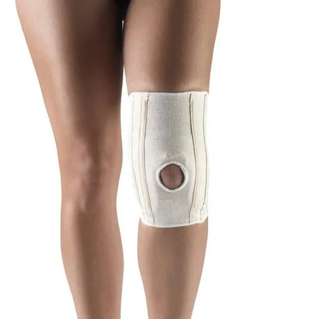 Knee brace on a person's leg with a white background - Okotoks HC Pharmacy