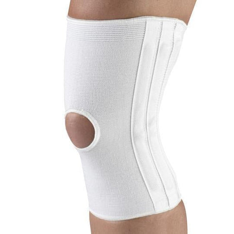 White knee brace on a person's leg against a white background - okotoks hc pharmacy