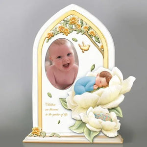 Decorative frame with a baby photo and sleeping baby design on a gray background - okotoks hc pharmacy
