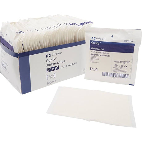 Curity Abdominal Pad packaging with a single pad displayed on a white background - okotoks hc pharmacy