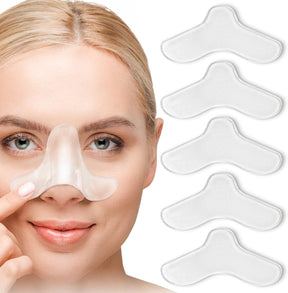 Woman using a nose patch with additional patches displayed on a white background - okotoks hc pharmacy