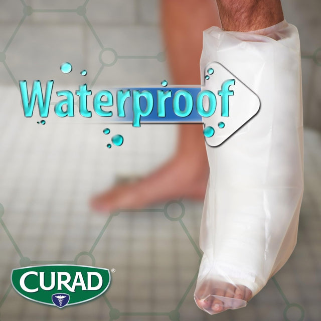 Person wearing a waterproof bandage on a leg with 'CURAD' branding. - okotoks hc pharmacy
