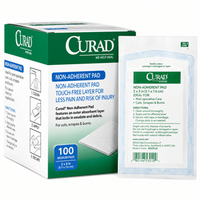 Curad non-adherent pad packaging with a single pad displayed in front on a white background - okotoks hc pharmacy
