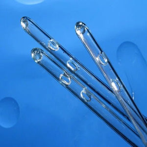 Three clear glass pipettes on a blue background - okotoks hc pharmacy