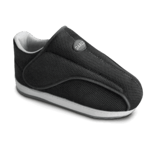 Black slip-on shoe with white sole on a white background - okotoks hc pharmacy