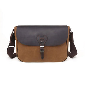 Brown and gray leather bag with a buckle on a white background - okotoks hc pharmacy