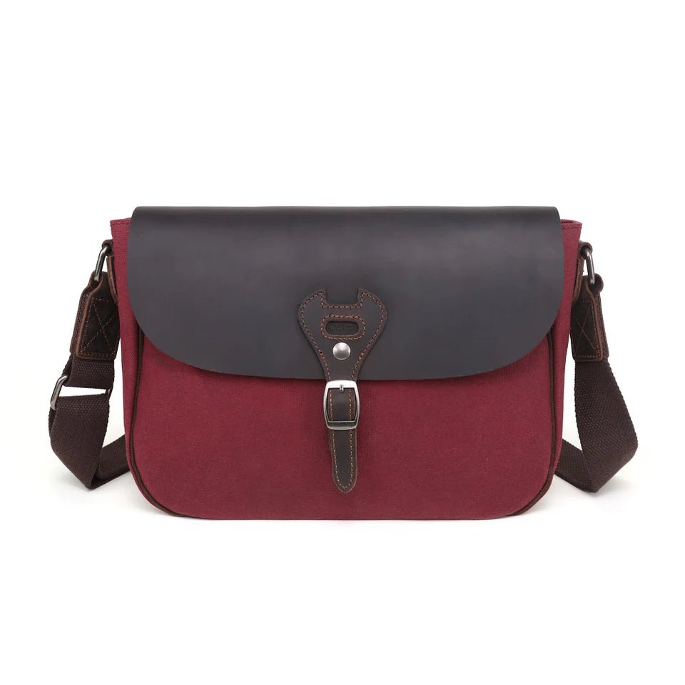Red and black leather satchel bag on a white background - okotoks hc pharmacy