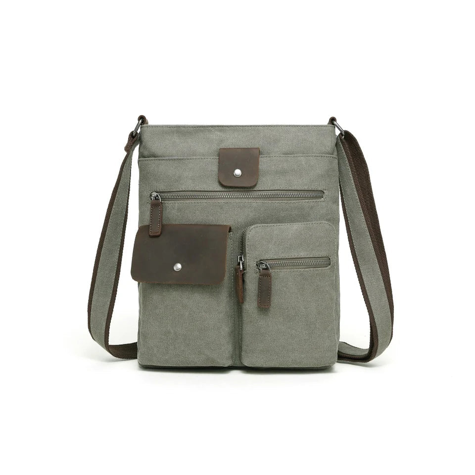 Green crossbody bag with brown accents on a white background - okotoks hc pharmacy