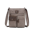 Brown crossbody bag with leather accents on a white background - okotoks hc pharmacy