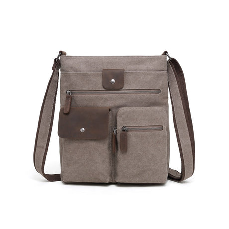 Brown crossbody bag with leather accents on a white background - okotoks hc pharmacy