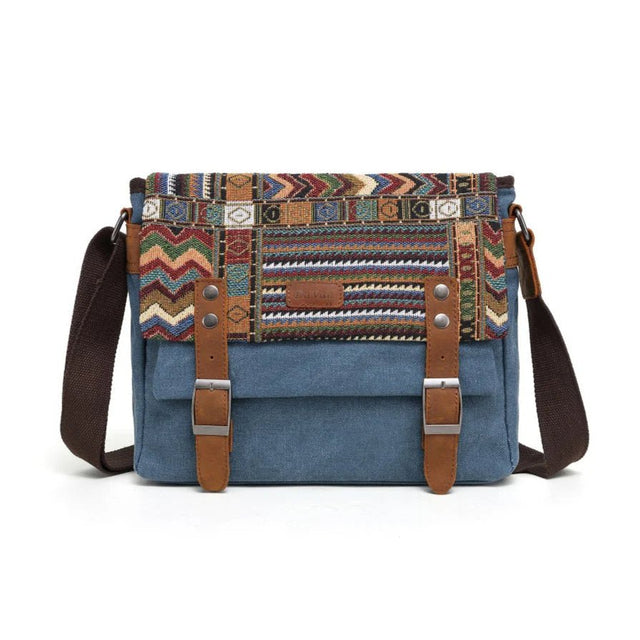 Blue bag with patterned top section and brown straps on a white background - okotoks hc pharmacy