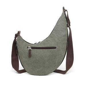 Green shoulder bag with brown straps on a white background - okotoks hc pharmacy