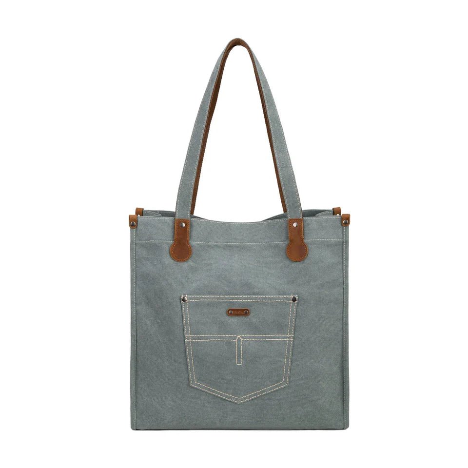 turquoise tote bag with brown leather straps and pocket on a white background - okotoks hc pharmacy