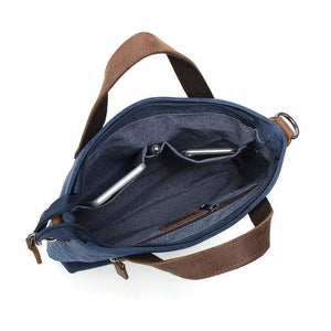 Blue bag with brown straps on a white background - okotoks hc pharmacy