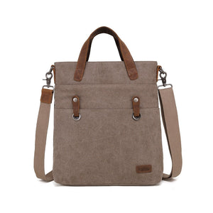 Brown canvas handbag with leather straps on a white background - okotoks hc pharmacy