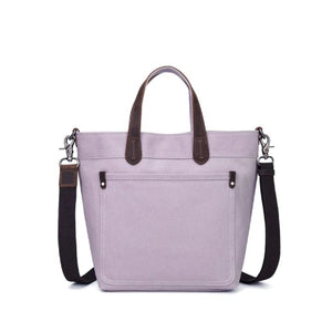 Purple tote bag with brown handles and black straps on a white background - okotoks hc pharmacy