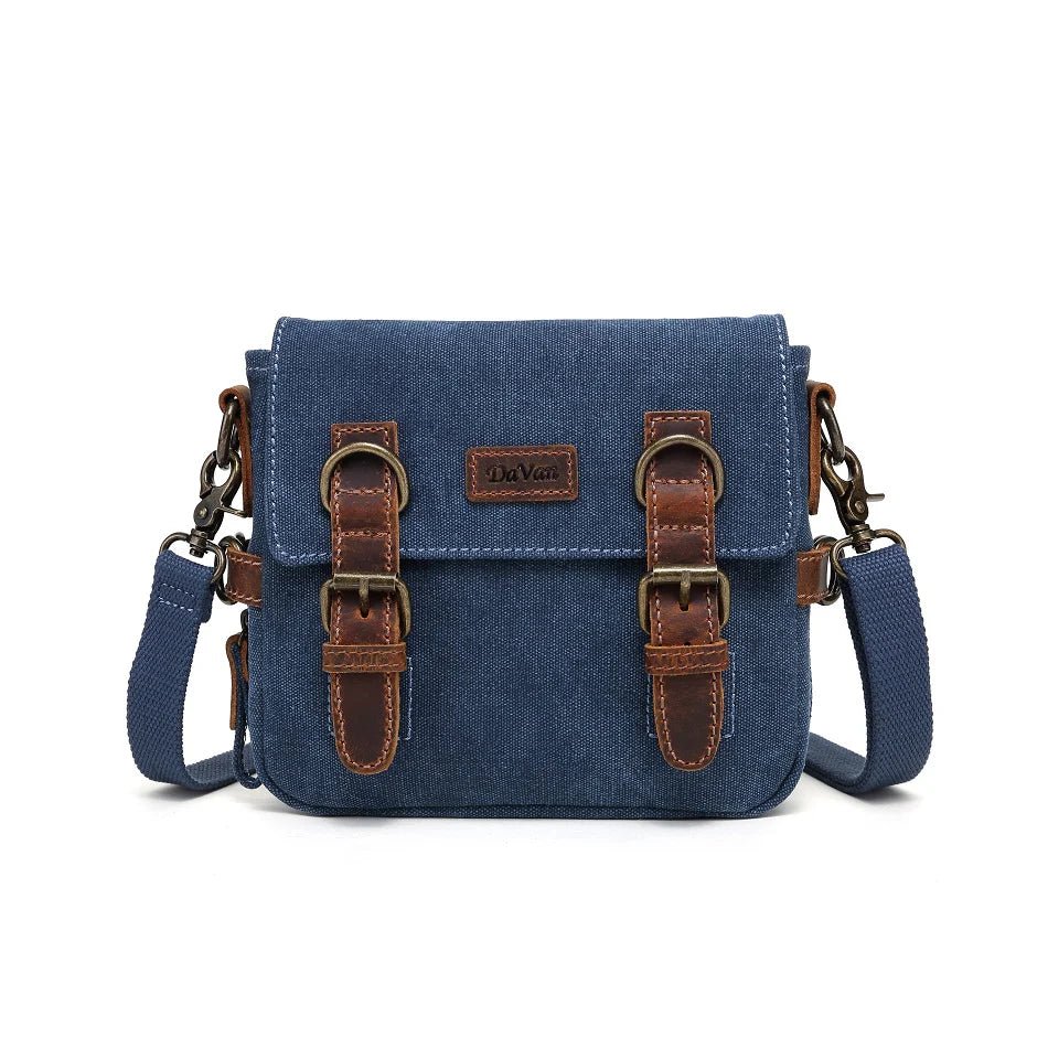 Blue canvas bag with brown leather straps on a white background - okotoks hc pharmacy