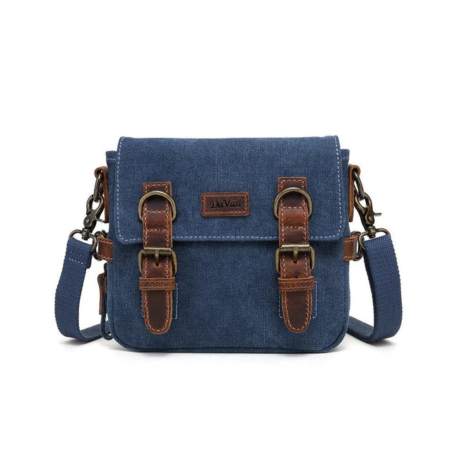 Blue canvas bag with brown leather straps on a white background - okotoks hc pharmacy