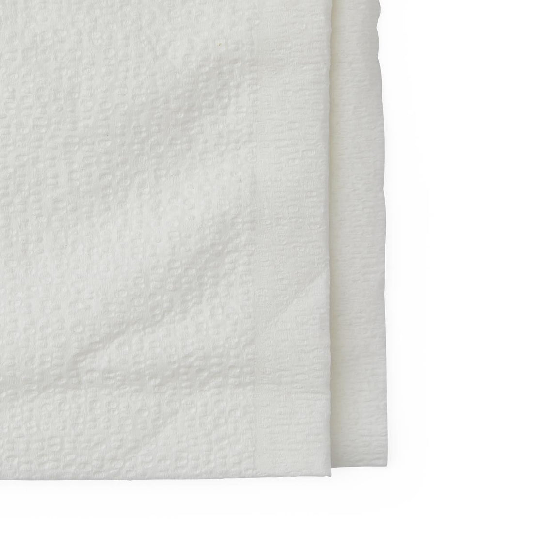 Close-up of textured white fabric on a white background - okotoks hc pharmacy