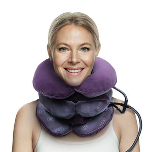 Woman wearing a purple neck pillow on a white background - okotoks hc pharmacy