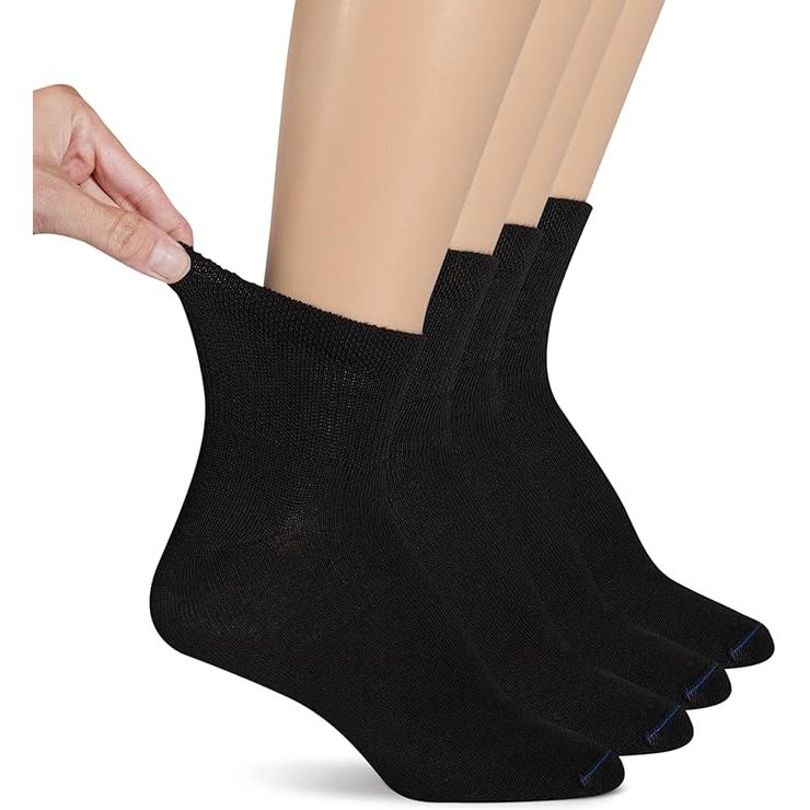 Set of black ankle socks with a hand holding one sock on a white background - okotoks hc pharmacy