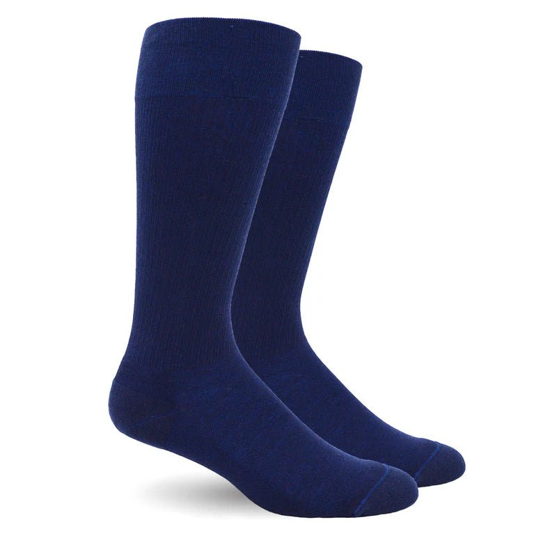 A pair of dark navy blue crew socks shown on a clean white background. - okotoks hc pharmacy