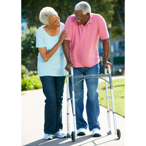 Senior couple with a walker outdoors on a sunny day - okotoks hc pharmacy
