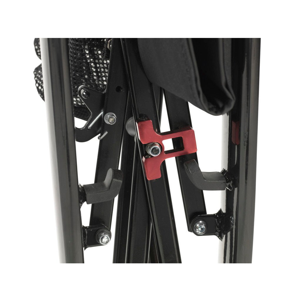 Close-up of a mechanical component with black metal frame and red accent on a white background - okotoks hc pharmacy