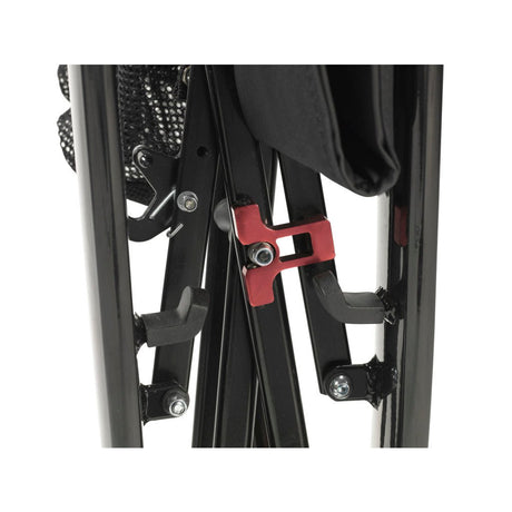 Close-up of a mechanical component with black metal frame and red accent on a white background - okotoks hc pharmacy