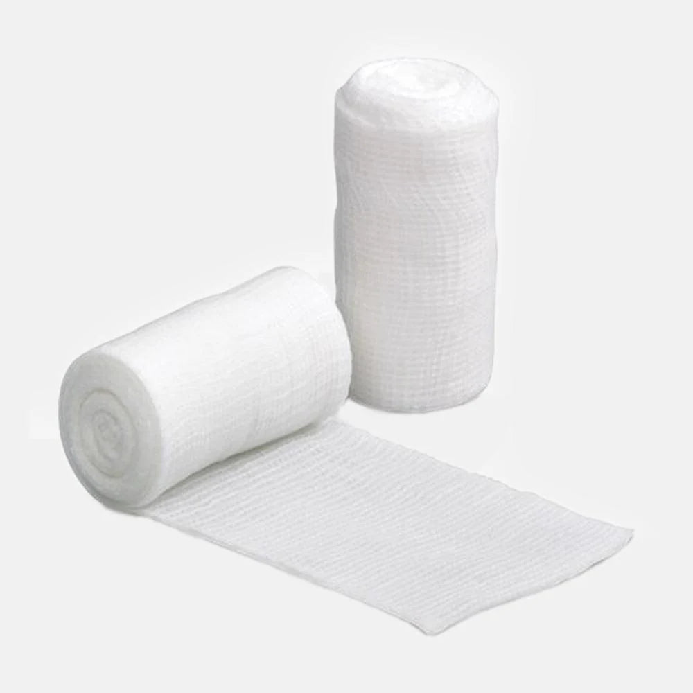 Two rolls of white bandage on a light gray background - okotoks hc pharmacy