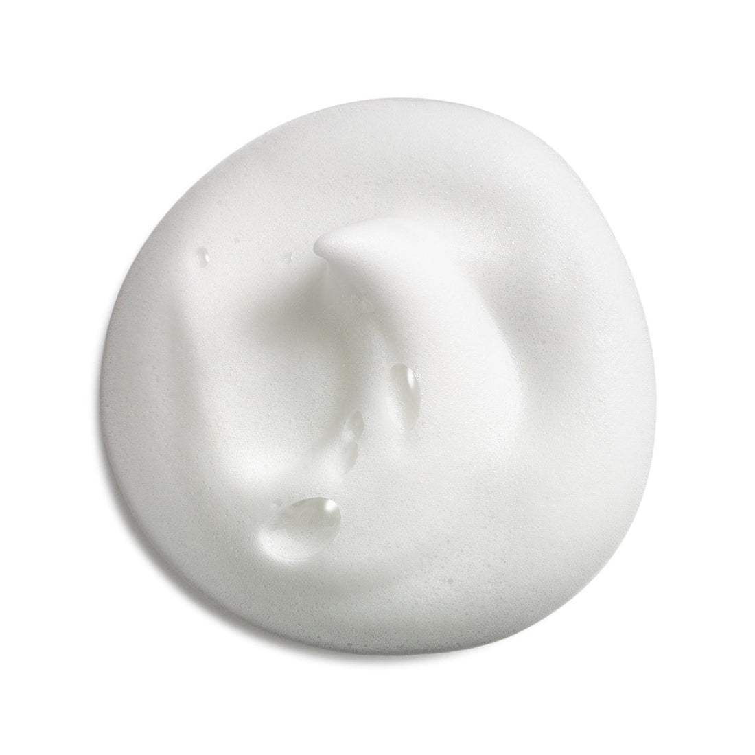A dollop of thick, creamy white cosmetic product, likely a moisturizer or facial cream, with a smooth, textured surface and small water droplets on a clean white background. - okotoks hc pharmacy