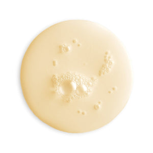 Close-up of a beige cream or lotion with bubbles on a white background - okotoks hc pharmacy