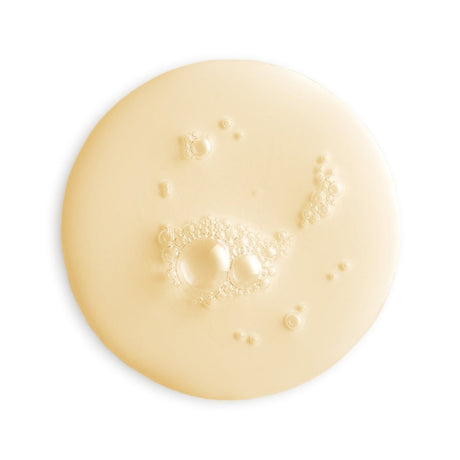 Close-up of a beige cream or lotion with bubbles on a white background - okotoks hc pharmacy
