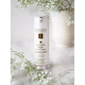 Eminence Lavender Night Eye Cream bottle with floral background