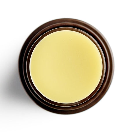 Round container with a brown lid on a white background - okotoks hc pharmacy
