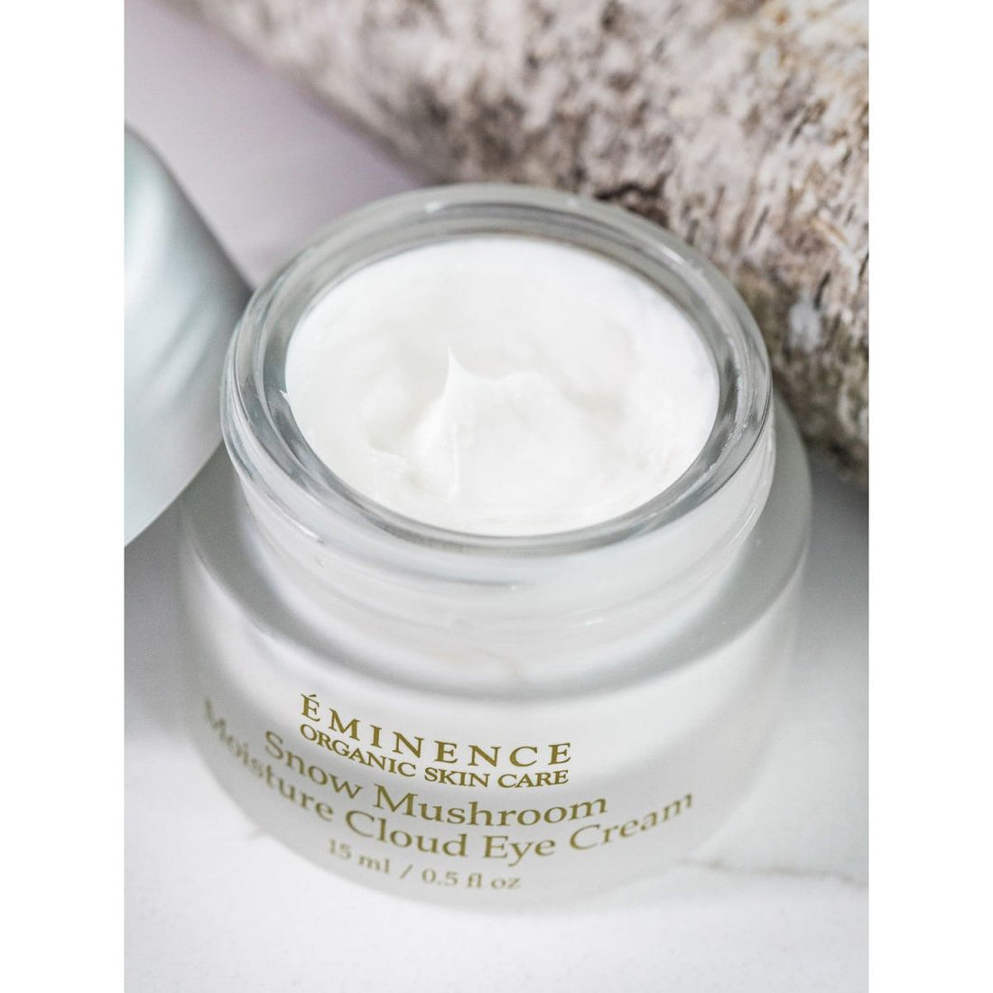 Eminence Snow Mushroom Moisture Cloud Eye Cream jar with cream visible on top - okotoks hc pharmacy