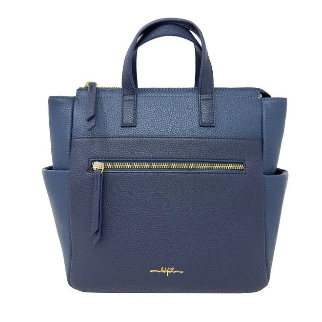 Blue handbag with a gold zipper and brand name on a white background - okotoks hc pharmacy