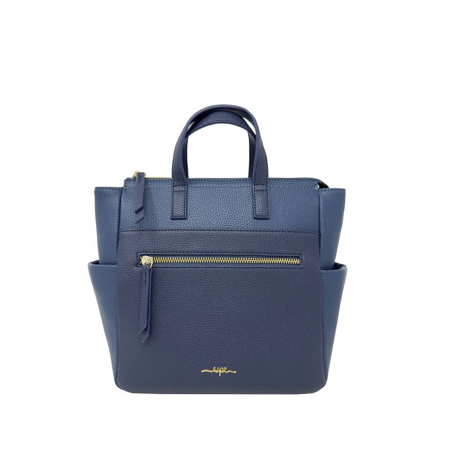 Blue handbag with a gold zipper and brand name on a white background - okotoks hc pharmacy