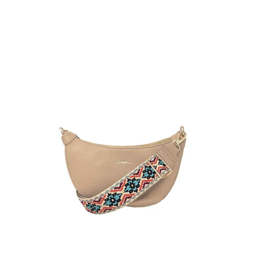 Beige handbag with a colorful strap on a white background - okotoks hc pharmacy