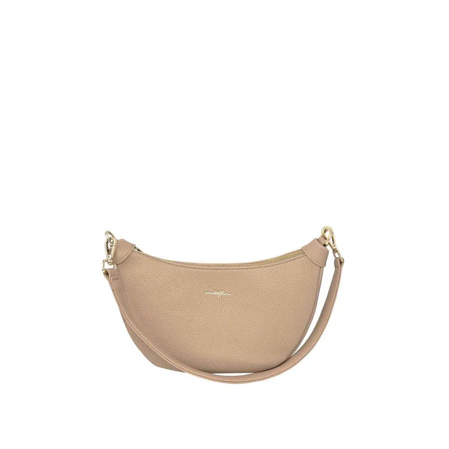 Beige handbag with a strap on a white background - okotoks hc pharmacy