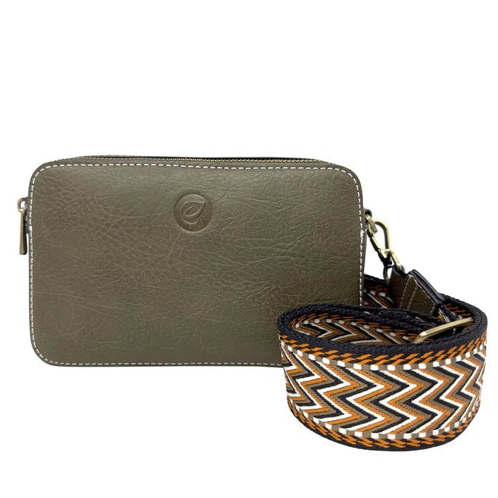 Green bag with a patterned strap on a white background - okotoks hc pharmacy