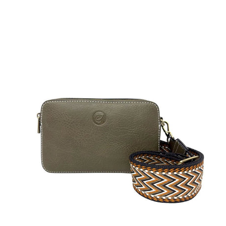 Green bag with a patterned strap on a white background - okotoks hc pharmacy