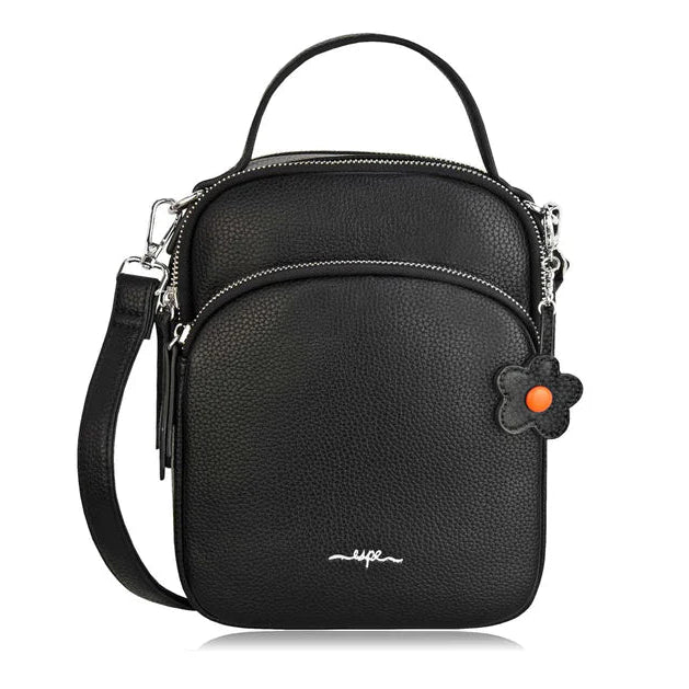 Black crossbody bag with a visible brand logo on a white background - okotoks hc pharmacy