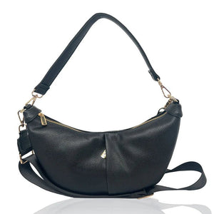Black handbag with gold accents on a white background - okotoks hc pharmacy
